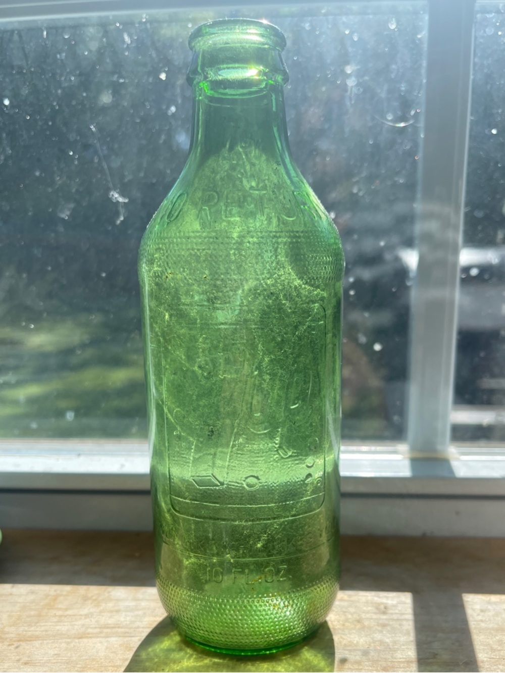 1960’s Green Embossed 7up Glass Bottle